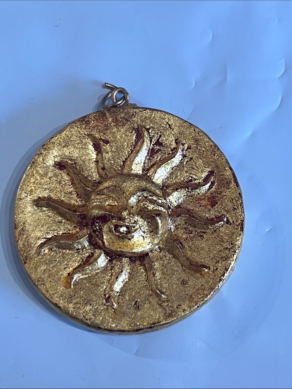 ARTISAN MADE SIGNED ON BACK, guilded gold sun face pendant or wall hang